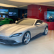 Unfathomably wealthy people shop for Ferrari cars in a Ferrari store in Midtown East in NYC.